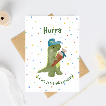 Einschulungskarte Dino – „Hurra, ich bin jetzt ein Schulkind“