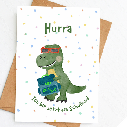 Einschulungskarte cooler Dino mit Sonnenbrille – „Hurra, ich bin jetzt ein Schulkind“